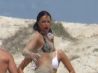Michelle Rodriguez curte praia no estilo à milanesa
