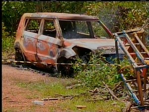 Os corpos foram encontrados perto de um carro queimado em uma estrada vicinal de São Valério da Natividade (Foto: Reprodução/TV Anhanguera)