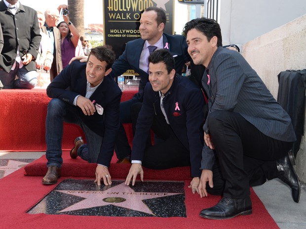 Joey McIntyre, Donnie Wahlberg, Jordan Knight e Jonathan Knight em Los Angeles, nos Estados Unidos (Foto: Robyn Beck/ AFP)