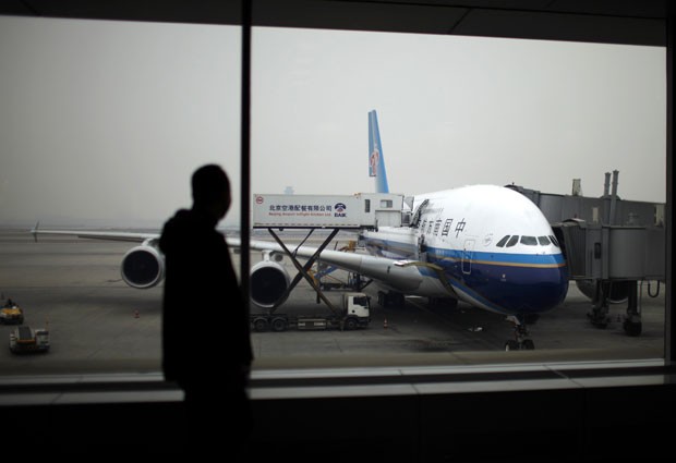 Incidente ocorreu com avião da companhia estatal Air China (Foto: Carlos Barria/Reuters)