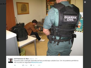Patrick Gouveia, suspeito de esquartejar família na Espanha, detido na sede da Guarda Civil espanhola em Madrid (Foto: Reprodução/Twitter/fgrruiz)