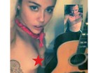 Miley Cyrus aparece fazendo topless em conversa via web com fotógrafos
