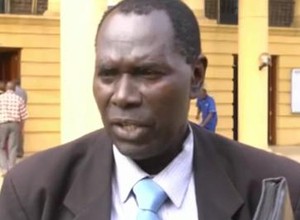 O advogado queniano Dola Indidis (Foto: Reprodução Youtube/Kiss TV) O advogado queniano Dola Indidis (Foto: Reprodução Youtube/Kiss TV)