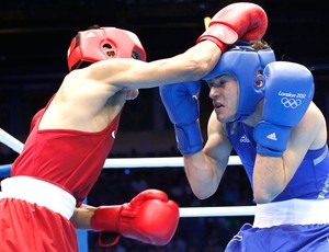 Julião Neto na luta de boxe contra Jeyvier Cintron Ocasio (Foto: Reuters)