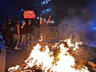 Ato em SP tem 7 detidos e ataque a loja de marca patrocinadora da Copa