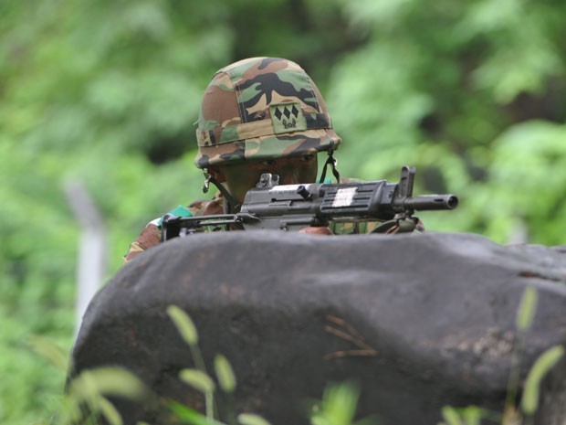 Soldado foi condenado por limpar fuzil em máquina de lavar na Coreia do Sul (Foto: AFP)
