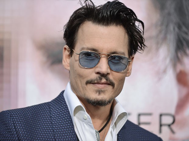 Johnny Depp chega para a première de 'Transcendence', em Los Angeles, em 10 de abril (Foto: Richard Shotwell/Invision/AP)