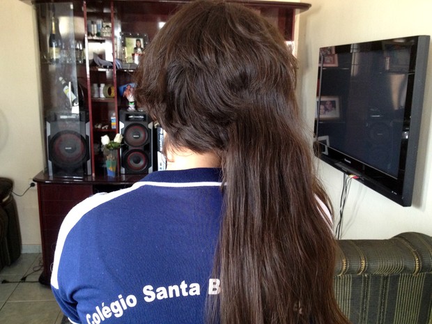 Menina disse que teve cabelo cortado com tesoura por duas garotas em Macapá (Foto: Abinoan Santiago/G1)