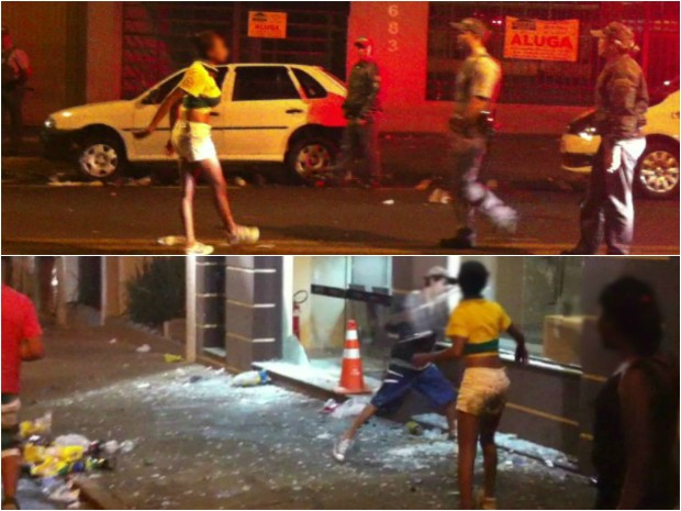 Jovem é flagrada enfrentando policiais e quebrando vidro de loja (Foto: Reprodução/ TV TEM)