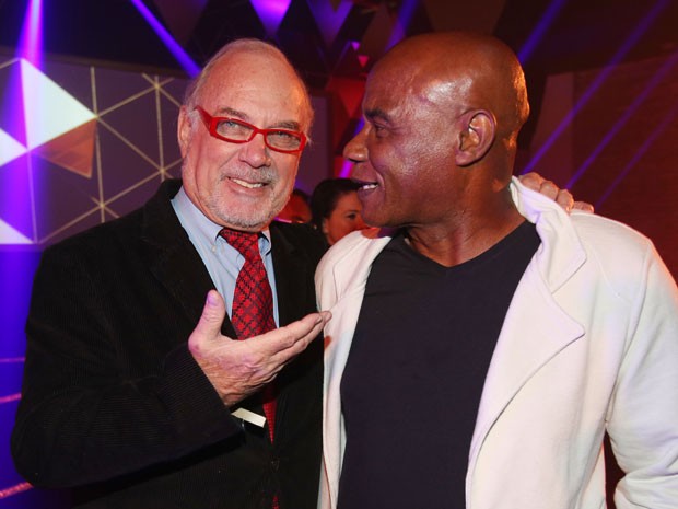 O produtor e cineasta Carlo Mossy (à esquerda) e seu pupilo, Kid Bengala, posam no Prêmio Sexy Hot 2015 (Foto: Eduardo Viana/Divulgação) O produtor e cineasta Carlo Mossy (à esquerda) e seu pupilo, Kid Bengala, posam no Prêmio Sexy Hot 2015 (Foto: Eduardo Viana/Divulgação)