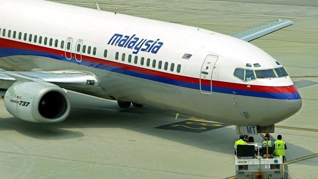 A companhia aérea Malaysia Airlines perdeu o contato com um de seus aviões, um Boeing 777-200, que ia para Pequim com 227 passageiros a bordo (Foto: EFE/EPA/AHMAD YUSNI)