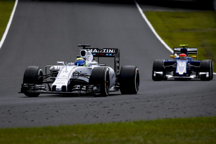 Felipe Massa e Felipe Nasr em ação no treino classificatório para o GP do Japão (Foto: EFE)