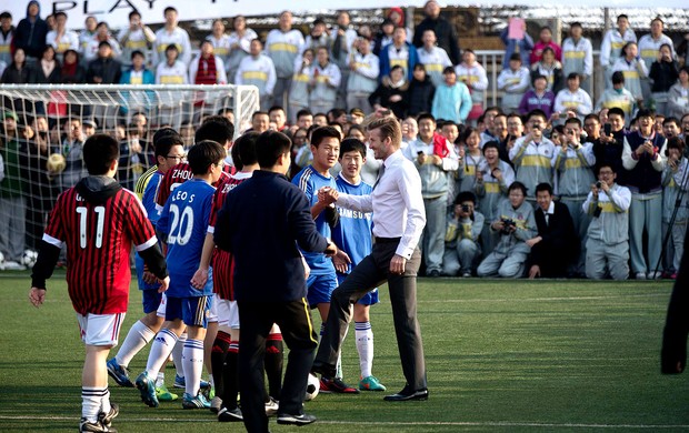 David Beckham promove o futebol na China (Foto: Agência AP)