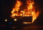 Grupos põem fogo em carros e em universidade na Venezuela (Geraldo Caso/AFP)