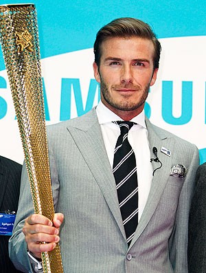 Beckham com a tocha olímpica (Foto: Reuters)