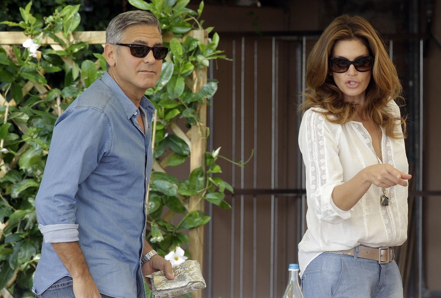 George Clooney e Cindy Crawford no Cipriani Hotel, em Veneza, onde o ator sobe ao altar com Amal Alamuddin