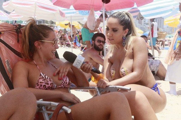 Renata Frisson, a Mulher Melão, foi à praia de Ipanema saber a opinião dos banhistas sobre a legalização do topless (Foto: Isac Luz/EGO) Renata Frisson, a Mulher Melão, foi à praia de Ipanema saber a opinião dos banhistas sobre a legalização do topless (Foto: Isac Luz/EGO)