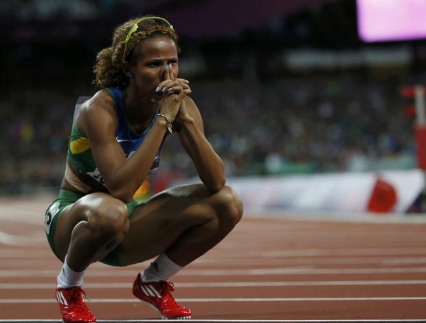 Evelyn terminou sua participação olímpica com o melhor tempo da carreira: 22s82  (Foto: Reuters)