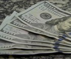 Dólar opera em alta e volta a superar R$ 4 (Reprodução Rede Globo)