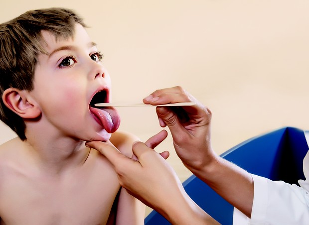 Dor de garganta; criança; pediatra (Foto: Edith Held/ Corbis)