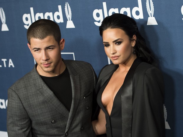 Nick Jonas e Demi Lovato em prêmio em Los Angeles, nos Estados Unidos (Foto: Valerie Macon/ AFP)