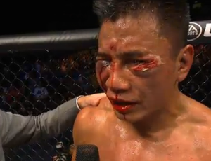 Cung Le destruído UFC Bisping (Foto: Reprodução Combate)