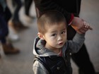 Alto funcionário chinês propõe política de 2 filhos obrigatórios