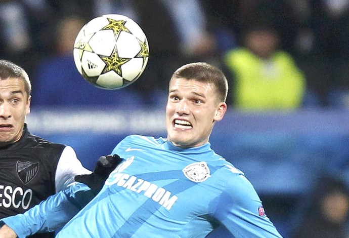 Denisov e Seba, Zenit e Malaga (Foto: Agência Reuters)