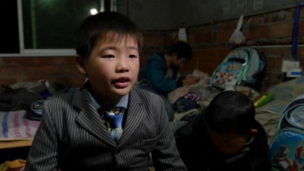 'Não quero viver separados dos meus pais", diz Tan Yuwen, de 11 anos (Foto: BBC)