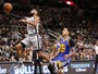 Em esvaziado jogo dos líderes, Spurs
surram Warriors e encostam no rival 
