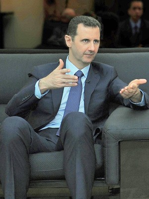 Bashar Al-Assad em entrevista feita em Damasco para o jornal russo Izvestia. (Foto: Sana/AFP)