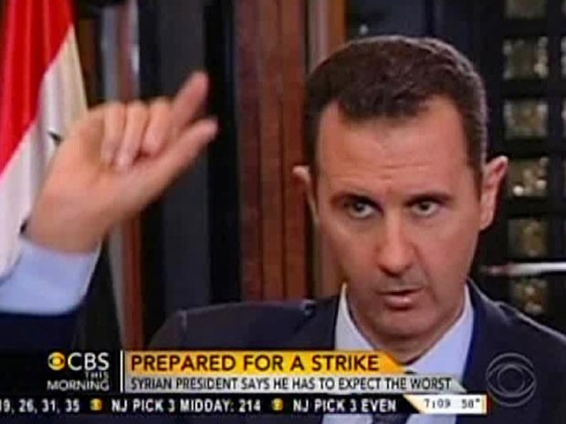 O presidente da Síria, Bashar al-Assad, em entrevista divulgada nesta segunda-feira (9) pela CBS (Foto: AP)