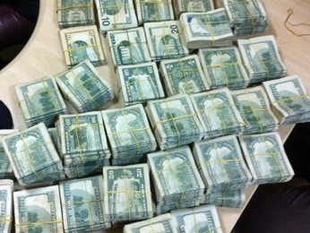 Dinheiro foi encontrado na casa dos proprietários de alguns estabelecimentos fechados (Foto: Divulgação / Polícia Federal)