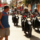 Morador de favela quer 
ação social 
além de PM (Glauco Araújo/G1)