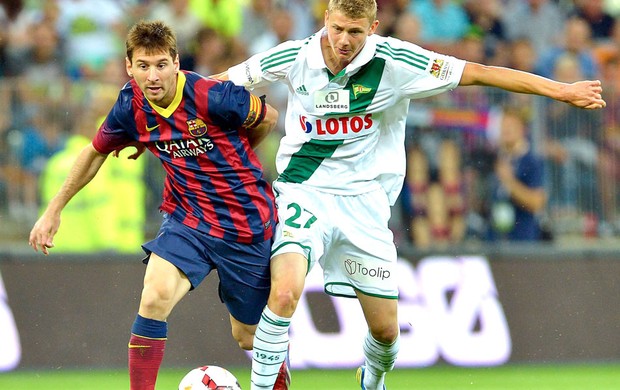 Messi e Pawel Lechia e Barcelona (Foto: Agência EFE)