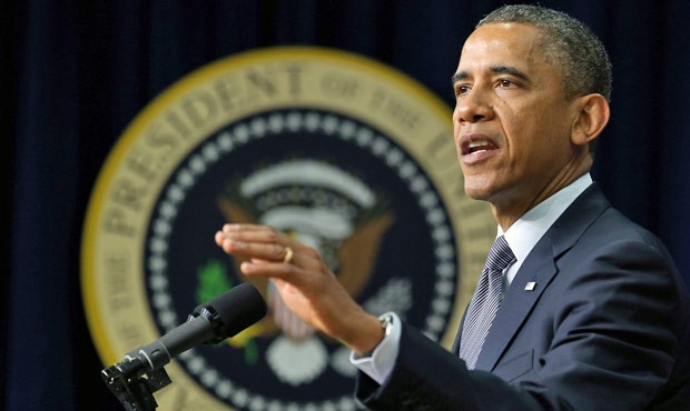 O presidente americano, ao anunciar a nova proposta de lei para controle de armas em Washington, no dia 16 (Foto: AFP)