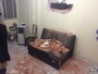 Retroescavadeira quebra parede da sala de apartamento em Copacabana