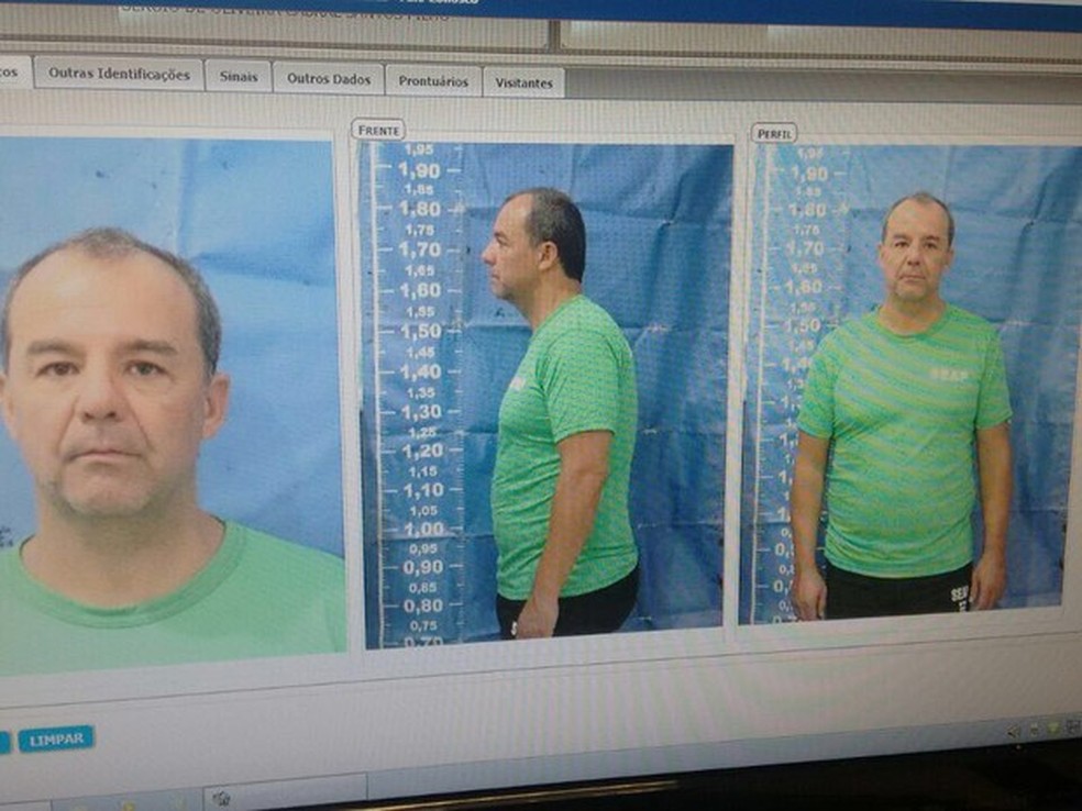 Imagem mostra Cabral com uniforme da Seap e de cabeça raspada, em novembro (Foto: Reprodução)