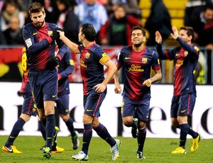 Pique comemora gol do Barcelona contra o Málaga (Foto: AFP)