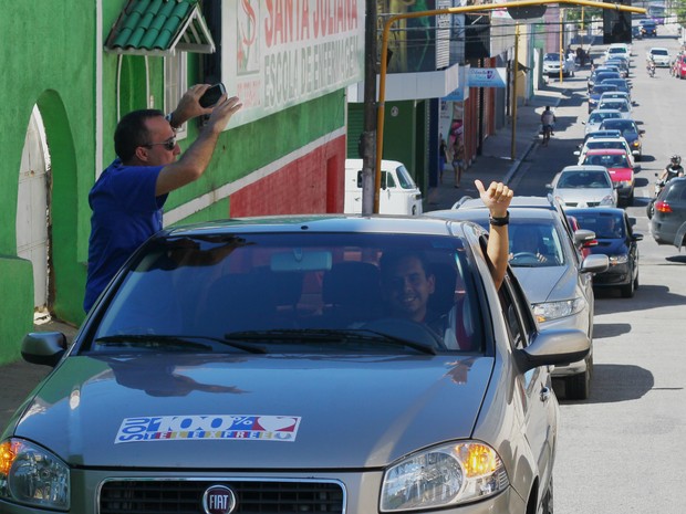 Divulgadores da empresa Telexfree saíram em carreata por ruas do Centro (Foto: Jonathan Lins/G1)