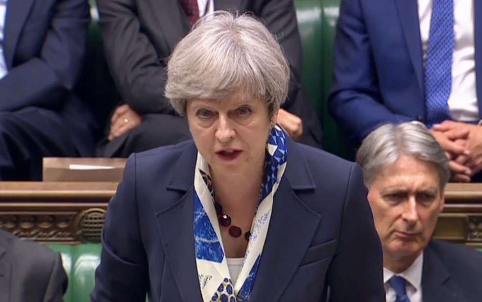 Theresa May durante discurso no Parlamento (Foto: HO / AFP)