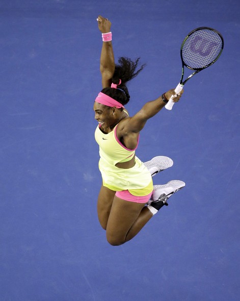 Serena Williams of the U.S. celebrates after defeating Maria Sharapova of Russia in their women's singles final at the Australian Open tennis championship in Melbourne, Australia, Saturday, Jan. 31, 2015. (AP Photo/Lee Jin-man)