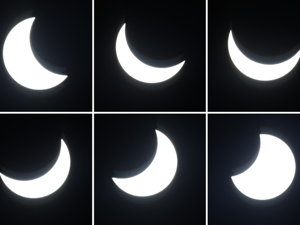 Combinao de imagens mostra a Lua atravessando a frente do Sol durante o eclipse desta sexta-feira (20). As imagens foram feitas em Berlim, na Alemanha (Foto: Michael Sohn/AP)