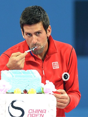 Djokovic e Na Li brincadeiras tênis exibição na China (Foto: AFP)
