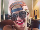 Rita Ora adere à moda do grillz
