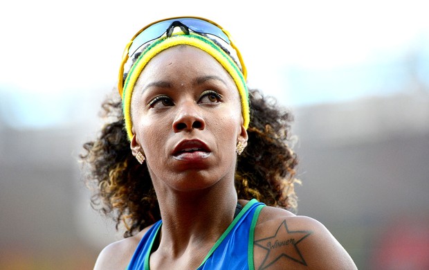 Rosângela Santos na chegada da prova dos 100m rasos (Foto: AFP) - rosangelasantos_100m_afp_95