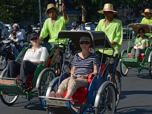 Ciclo-táxis do Camboja, veículos tradicionais a pedal (Foto: Tang Chhin Sothy/AFP Photo)