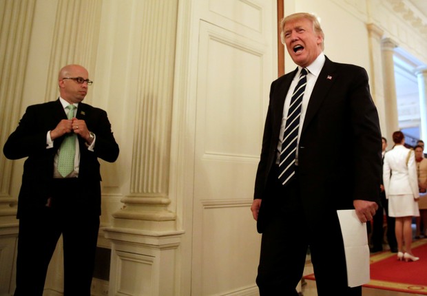 Donald Trump chega ao Infrastructure Summit, na Casa Branca (Foto: Yuri Gripas/Reuters)
