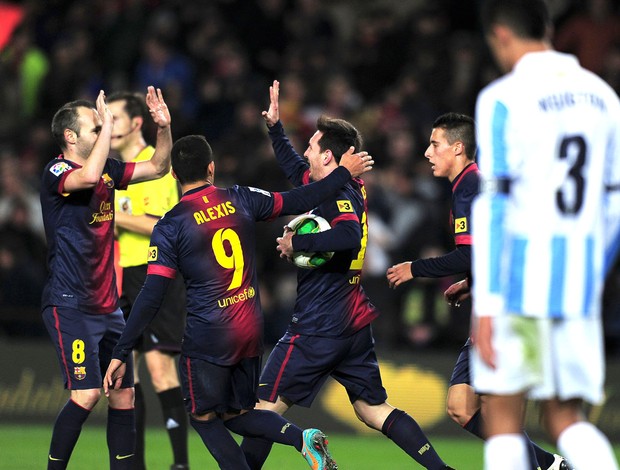 Comemoração do Barcelona contra o Malaga (Foto: Agência AFP)