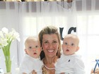 Ex-paquita Roberta Cipriani batiza os filhos gêmeos